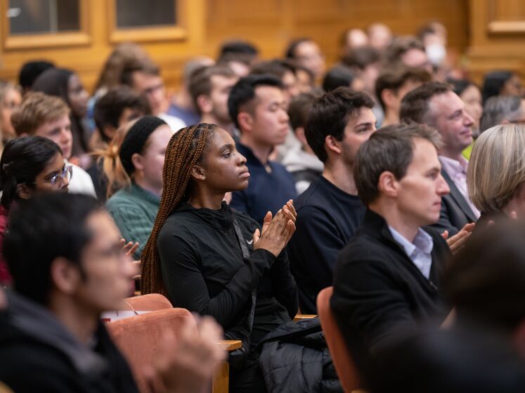 Audience clapping at an LSE event