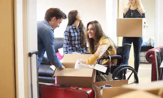 Student in a wheelchair moving in to halls of residence