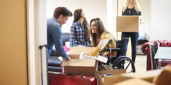 Student in a wheelchair moving in to halls of residence