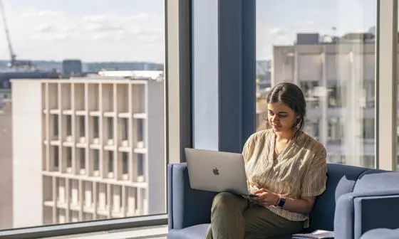 Girl studying at laptop