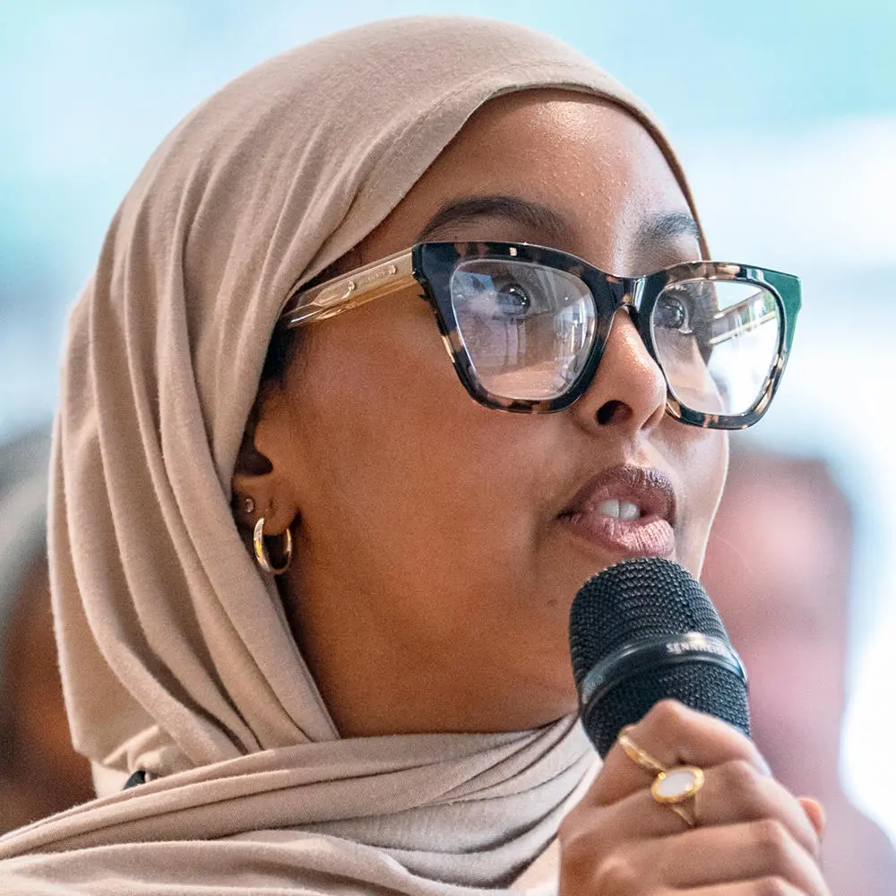 A member of the audience asking a questions at an LSE event
