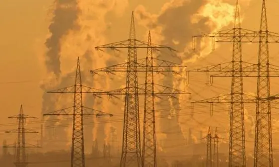 pylons and chimneys producing smoke