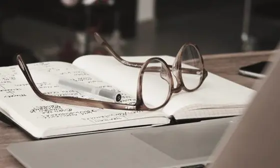 glasses and notebook