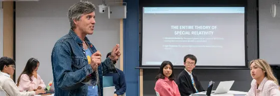 Professor Bryan W. Roberts delivering a lecture