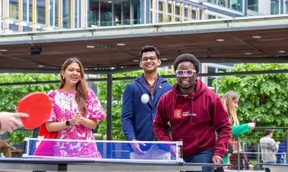 Students playing ping pong