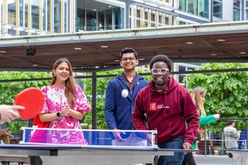Students playing ping pong