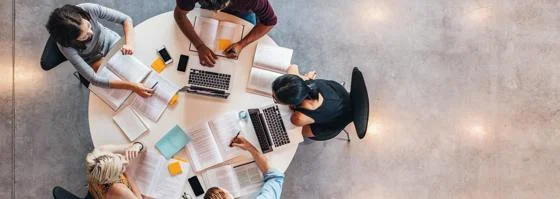Global_Programmes_Stock_topview_students_around_table-cropped