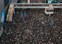 A bird-eye view of large crowd of protestors filling up streets of Hong Kong