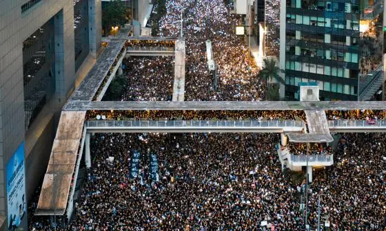 A bird-eye view of large crowd of protestors filling up streets of Hong Kong