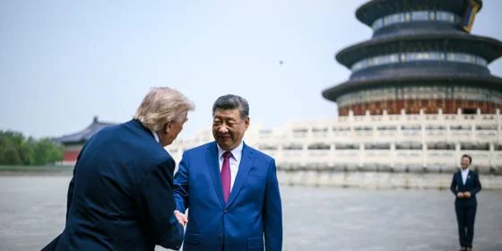 President Donald Trump and President Xi Jinping shaking hands