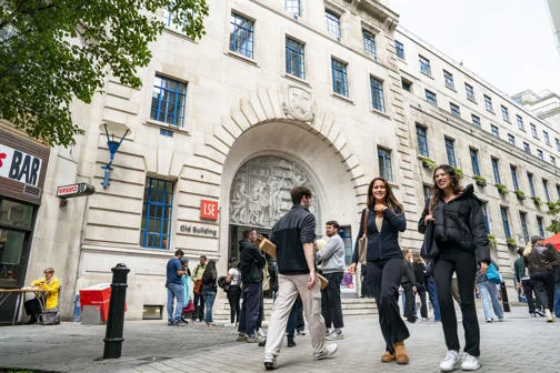 Students outside LSE Old Building on campus