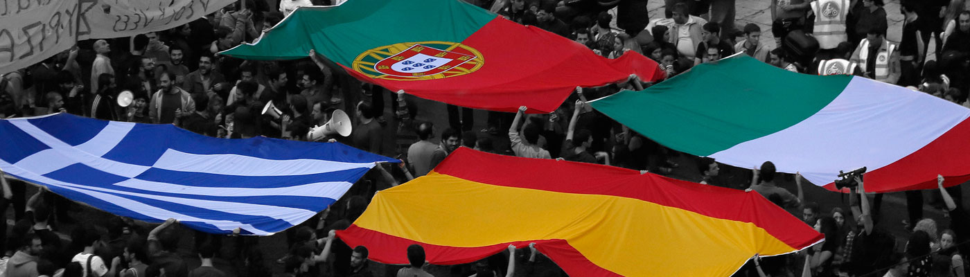 Portuguese, Italian, Greek, and Spanish flags in crowd
