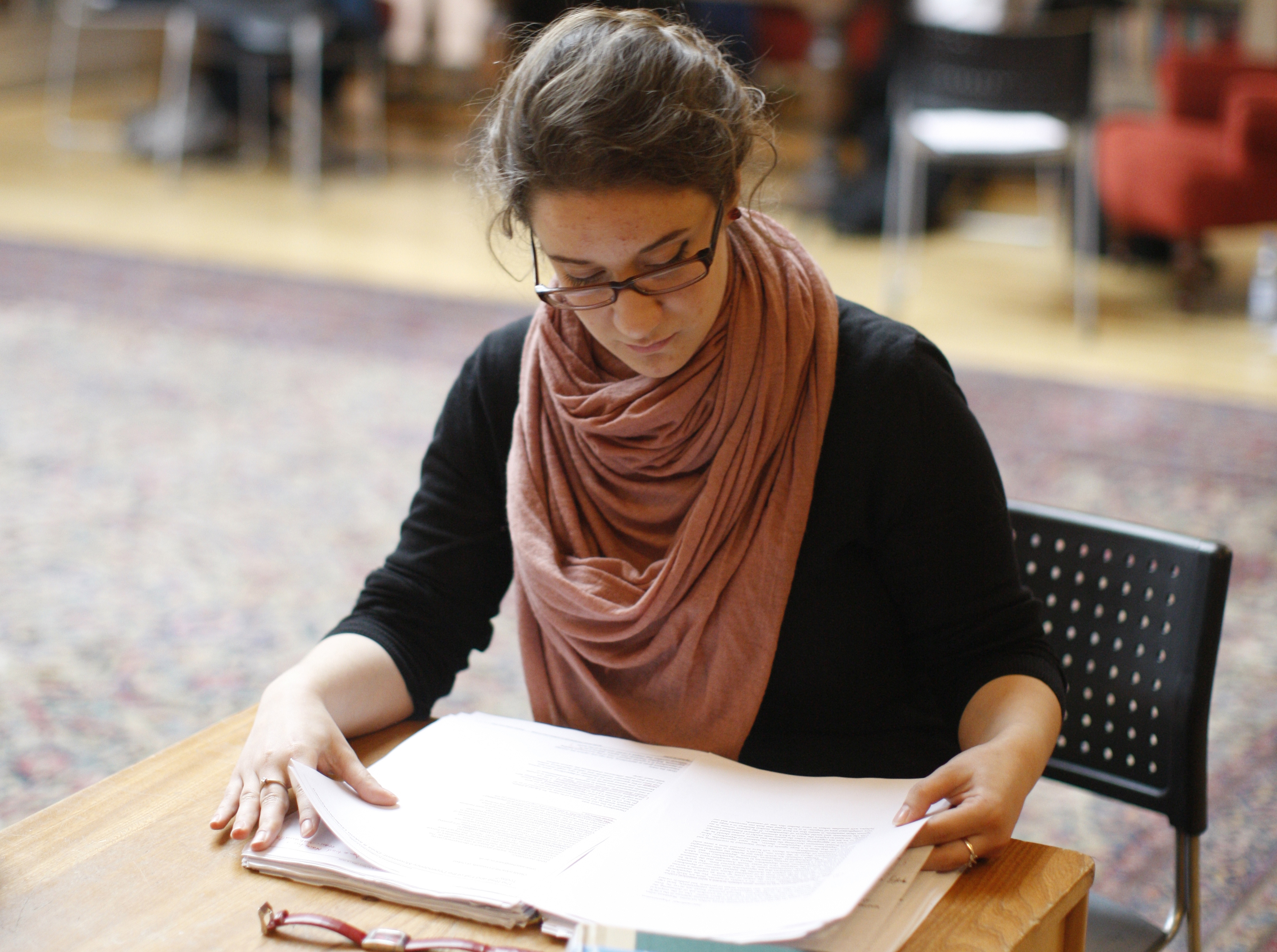 Student reading in library