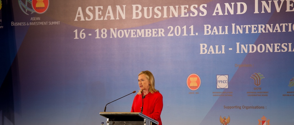 Hillary Clinton standing at a podium at the ASEAN business conference