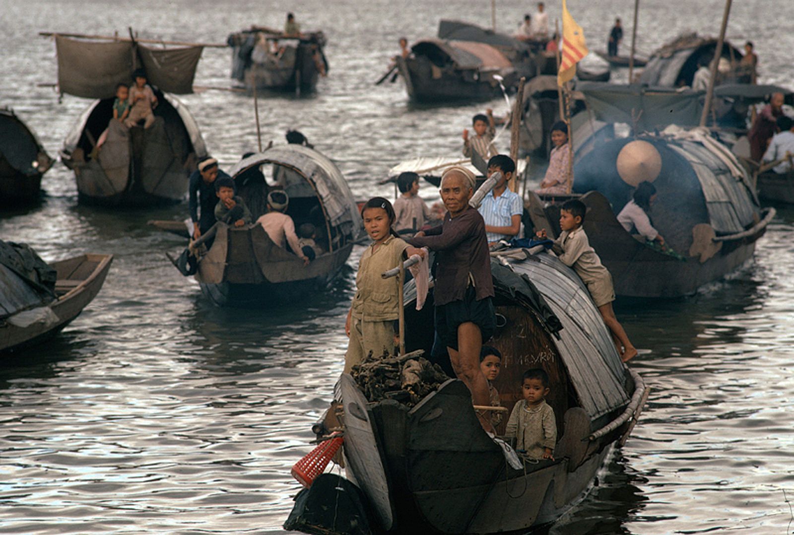 Vietnamese migrants in small boats at sea