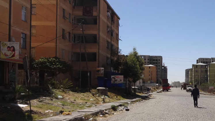 Man walking down urban street in Africa