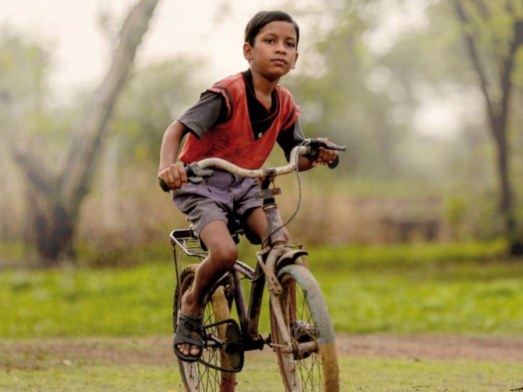 Child_Cycling_747x560