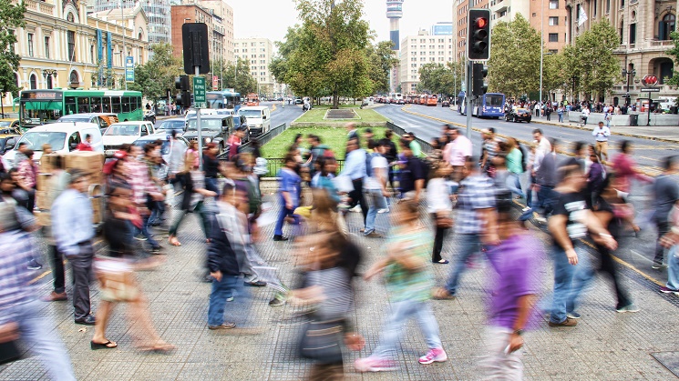 crowd walking across street by mauro-mora-unsplash