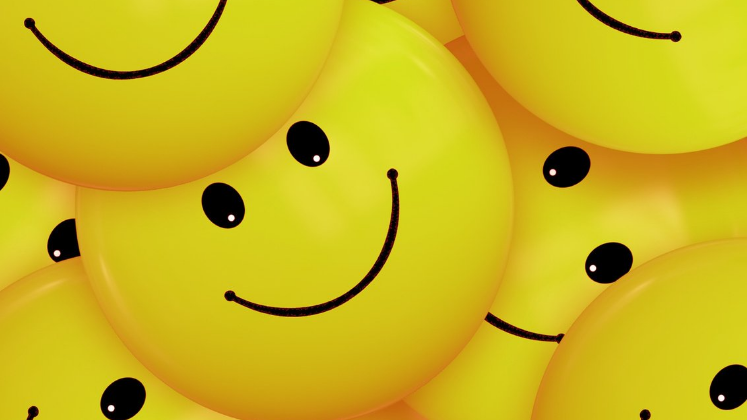 Yellow smiling balloon faces_stock image via Canva_747x420