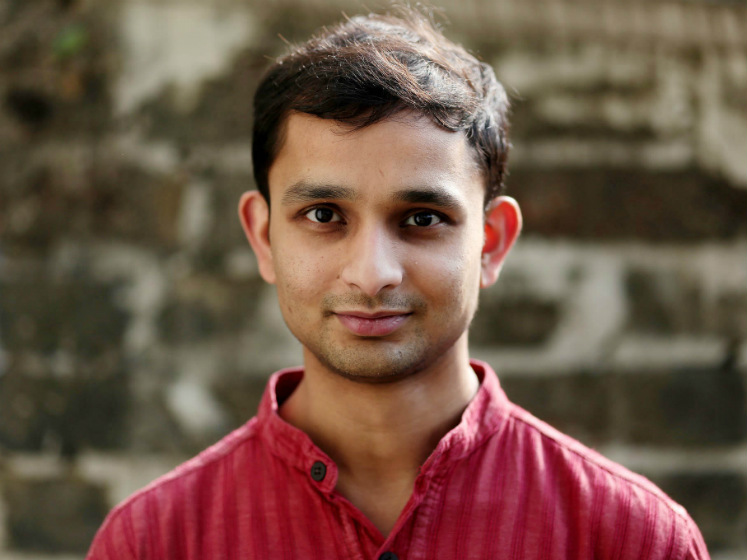 A headshot of Sroyon Mukherjee