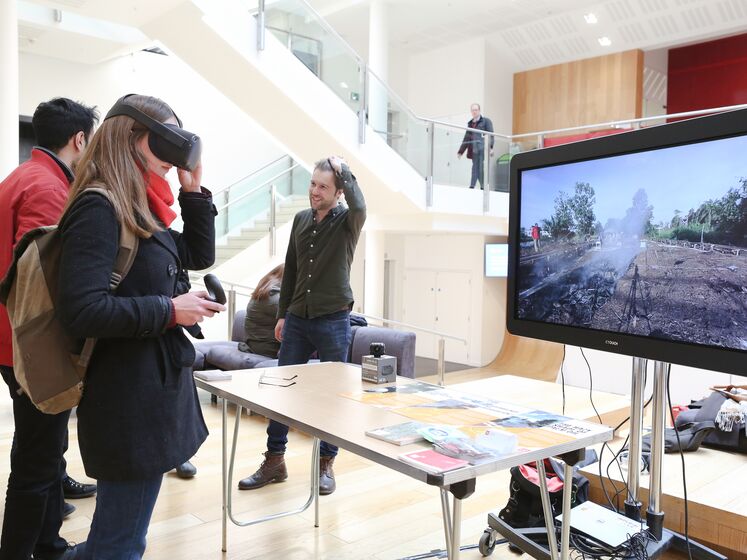 Two visitors try out the VR at Dr Thomas Smith's Research Showcase stand at the LSE Festival, March 2020. LSE/Maria Moore..