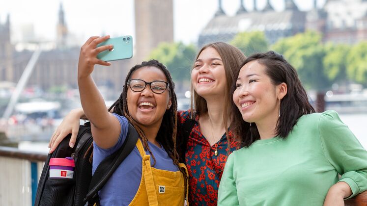 LSE students taking a selfie at Westminster