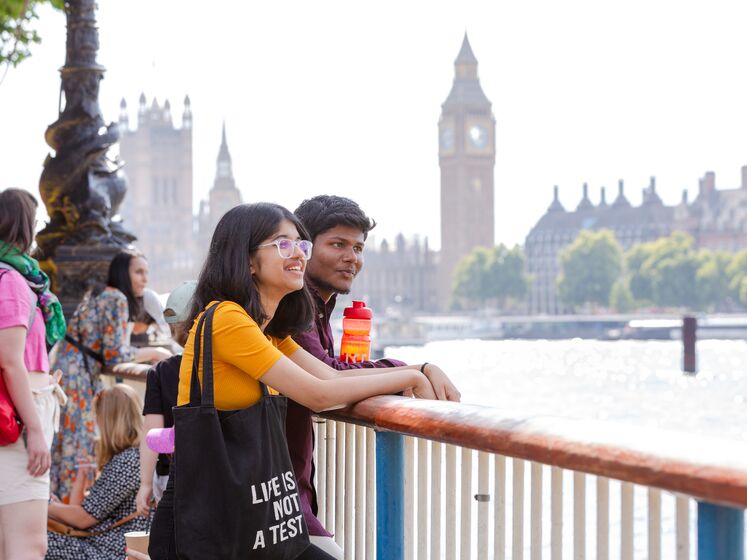 LSE students in London, Big Ben and Westminster in the background