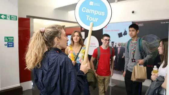 Campus tour guide during a campus tour for prospective students.