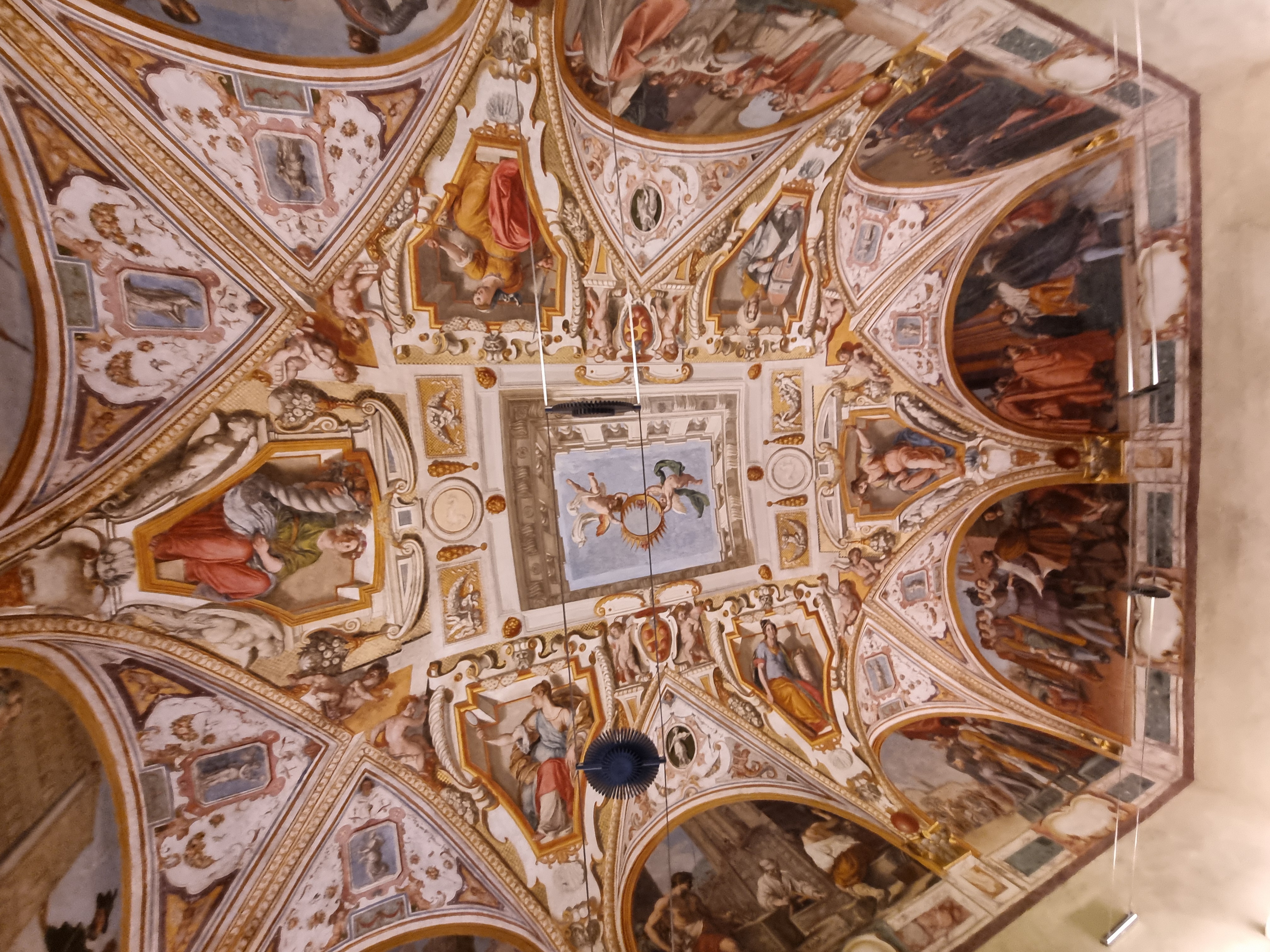 Painting of figures on the ceiling at Palazzo Buonotalenti. 