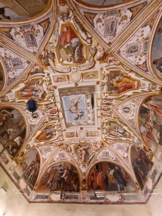 Painting of figures on the ceiling at Palazzo Buonotalenti.