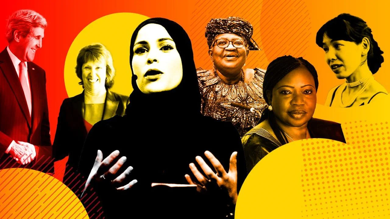 John Kerry with a collection of women diplomats