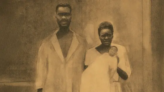 Two enslaved people holding a baby