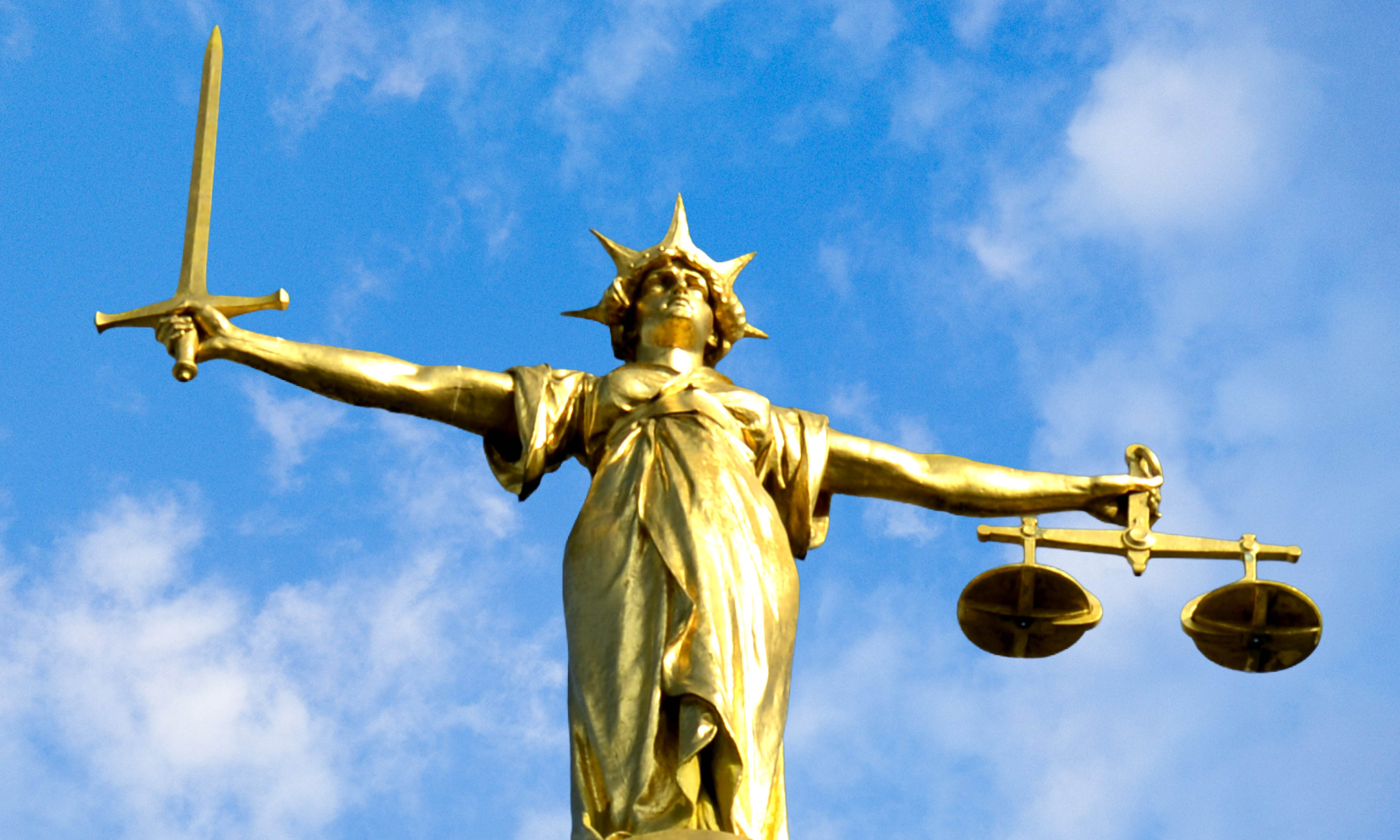 The statue of justice, which stands on the Old Bailey courthouse in London. 