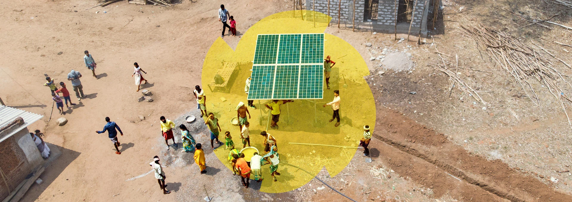 Construction workers holding solar panel