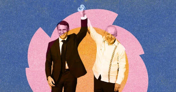 Macron and Lula at the last COP meeting holding hands raised in the air.