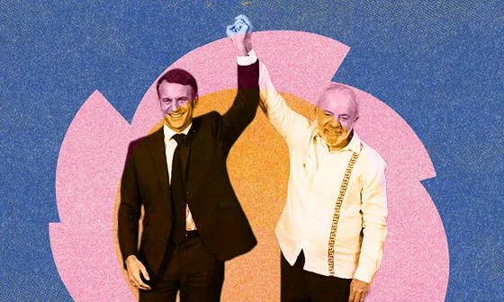 Lula and Macron holding hands at the last COP meeting