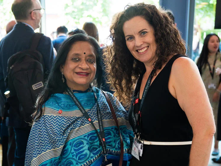 Nayantara Palchoudhuri (left) photographed with Tricia Coyle, from LSE's alumni engagement team, during the 2025 Leadership Forum
Dr Nayantara Palcho