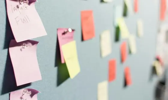Post it notes on a board