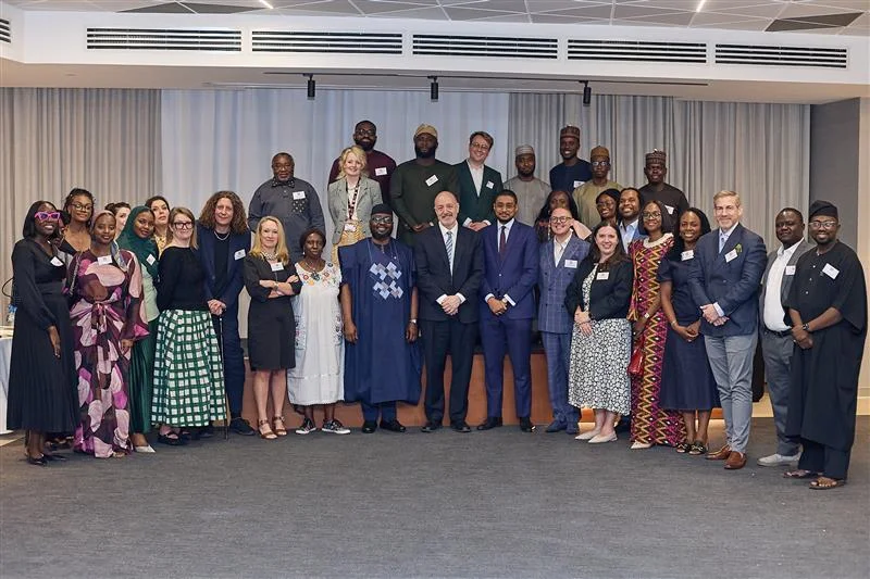 LSE alumni and staff gather for a photo during an event in Abuja