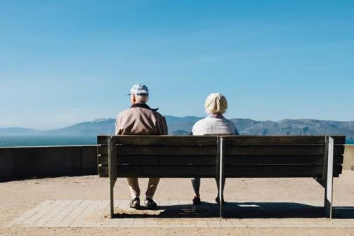 Older people sitting on a bench