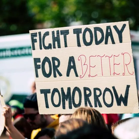 Fight today for a better tomorrow sign. By Pexels