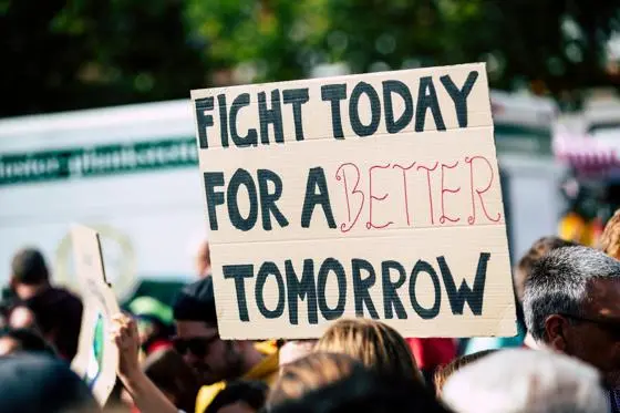 Fight today for a better tomorrow sign. By Pexels