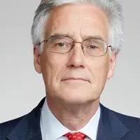 A headshot of Lord Adair Turner