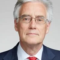 A headshot of Lord Adair Turner