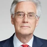 A headshot of Lord Adair Turner