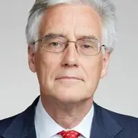 A headshot of Lord Adair Turner