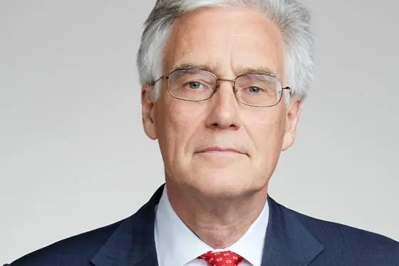 A headshot of Lord Adair Turner