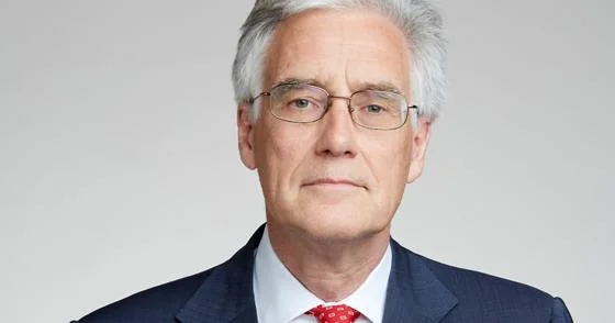 A headshot of Lord Adair Turner