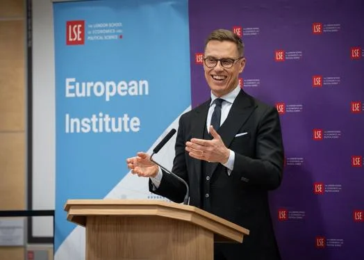 President of Finland Alexander Stubb gives a lecture at a podium at LSE
