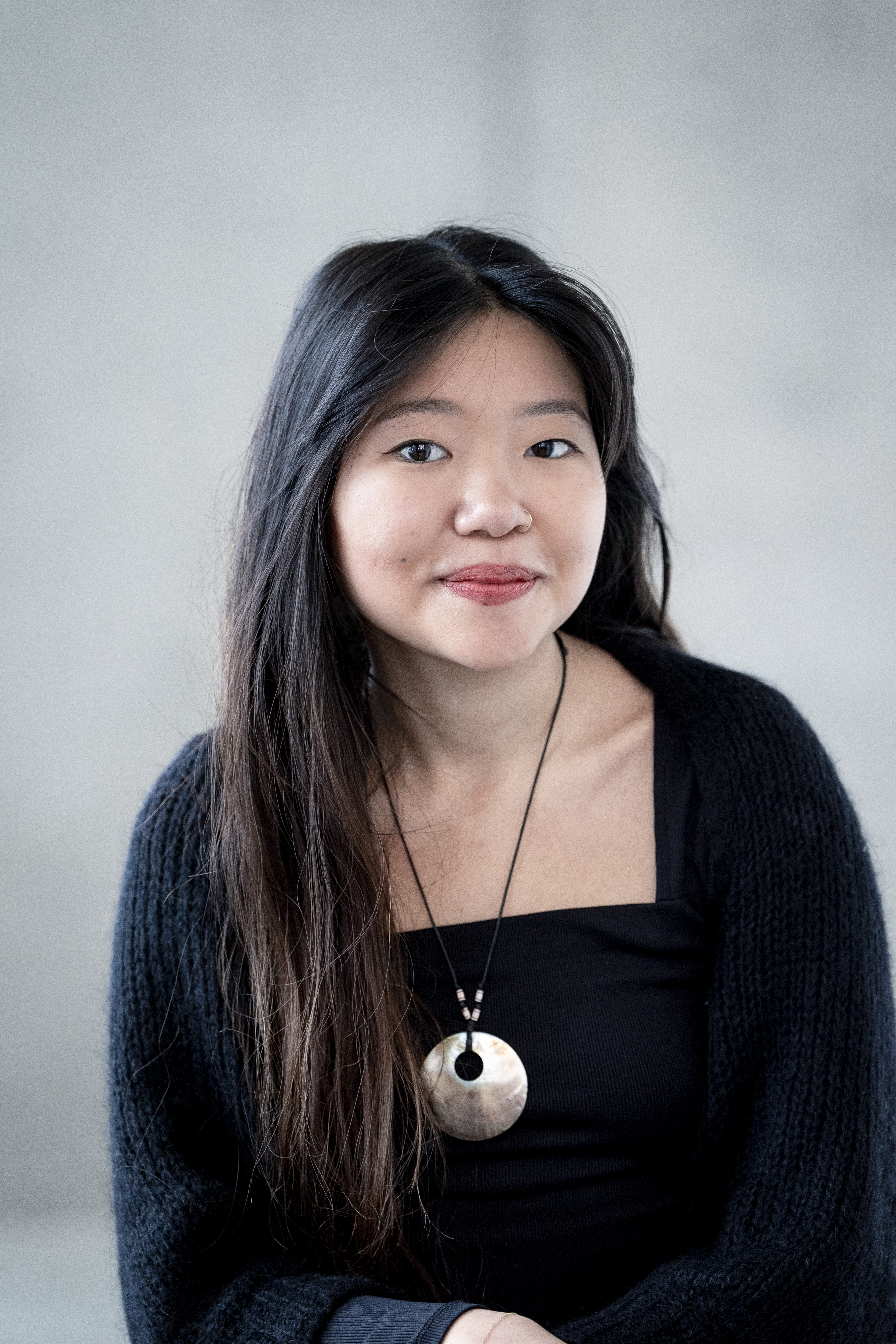 Alexis with shell necklace